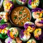 Fresh shrimp mango rice paper rolls served with lime peanut sauce