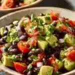Fresh Avocado and Black Bean Salad served in a bowl