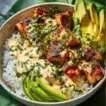 Delicious Coconut Chicken Rice Bowl with tender chicken and coconut rice