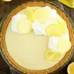 Easy lemon cream pie with whipped cream topping and lemon zest garnish.