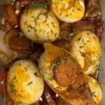 Delicious egg boil with sausage served on a plate