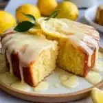 Irresistibly sweet and moist gâteau au citron elegantly presented on a dessert table