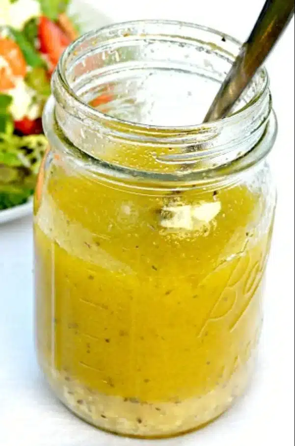 Fresh Lemon Vinaigrette drizzled over a colorful salad