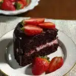 Delicious strawberry chocolate cake with fresh strawberries and chocolate frosting