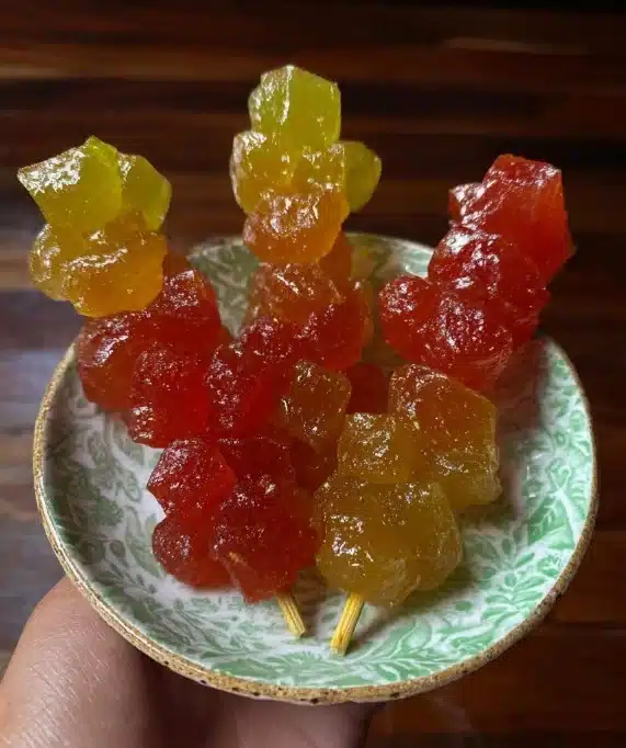 Homemade Tanghulu - Chinese candied fruit on a stick, a tasty dessert.