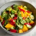 Colorful Thai Mango Salad with fresh ingredients and vibrant presentation