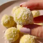 Zesty lemon bliss balls, healthy snack made with lemon and nuts.