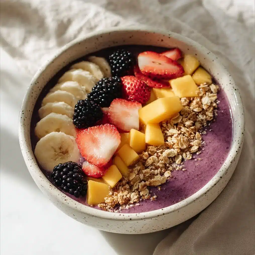 Acai bowl topped with fruits, nuts, and granola for a nutritious meal