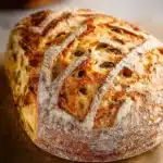Freshly baked Jalapeño Cheddar Sourdough bread with a golden crust
