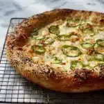 Delicious Jalapeño Popper Pizza topped with cheese and jalapeños