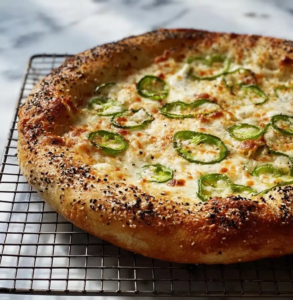 Delicious Jalapeño Popper Pizza topped with cheese and jalapeños