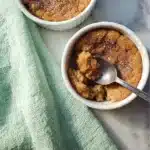 Delicious homemade oatmeal cake muffins topped with nuts and spices