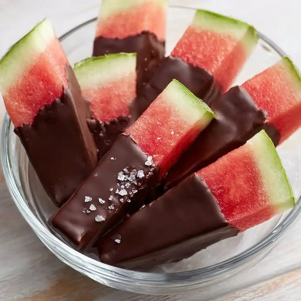Delicious chocolate covered watermelon slices drizzled with chocolate.