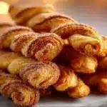 Freshly baked Cinnamon Twists drizzled with icing for a sweet treat