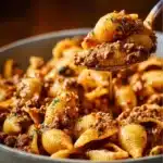Creamy beef and shells dish served in a bowl