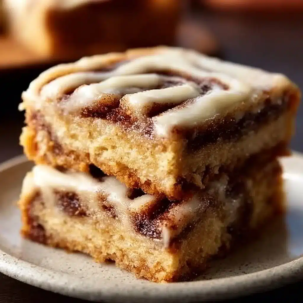 Irresistible cinnamon roll bliss bars topped with icing