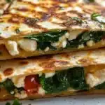 Spinach and feta quesadillas served with salsa and fresh herbs